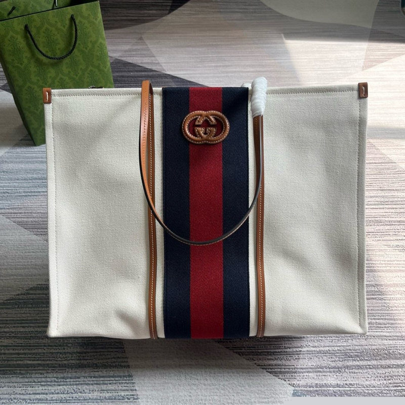 G*u*i shopping bags
